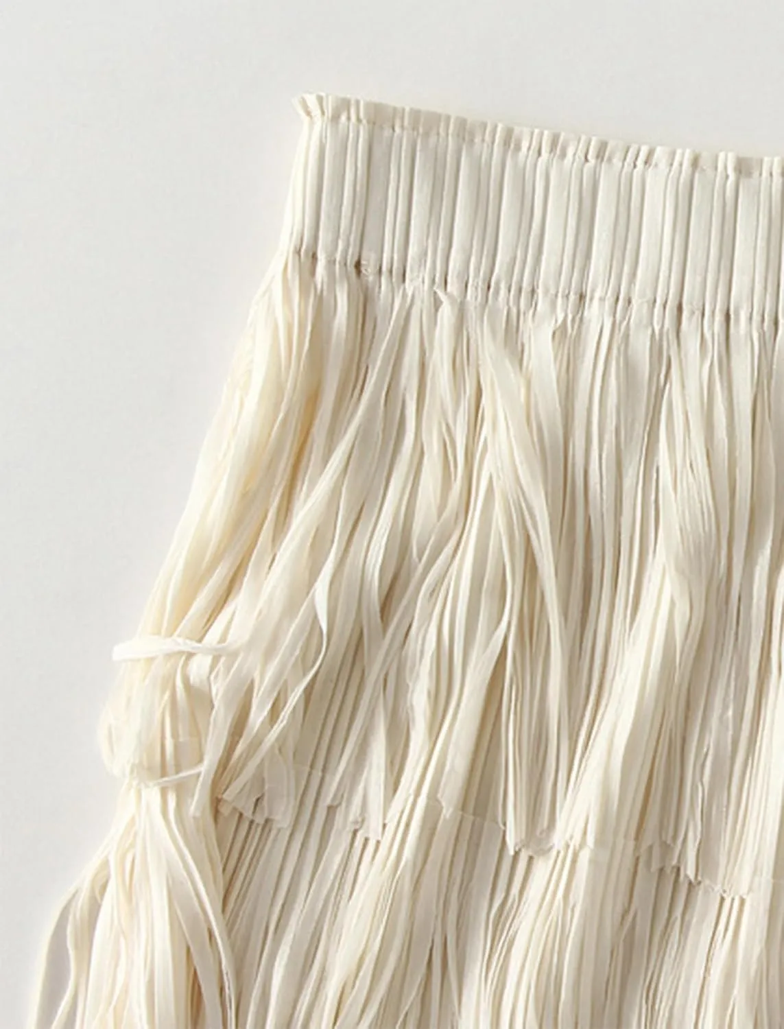 IWEMEK Elastic High Waist Fringe Skirts for Women Tassels Tiered Layered Midi Skirts Fall Christmas Party Casual A-Line Skirt